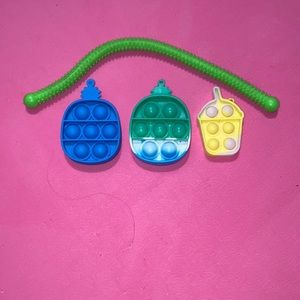 4PCS. Pop it bundle of 3 3” fidgets and 1 11” monkey noodle